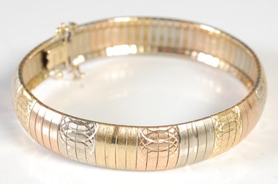 Lot 210 - An Italian tri-colour 18ct gold articulated...