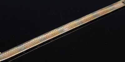 Lot 210 - An Italian tri-colour 18ct gold articulated...