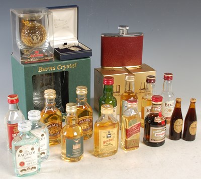 Lot 316 - A box of assorted whisky miniatures, hip flask,...