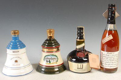 Lot 321 - Four bottles of spirits to include Dunhill Old...