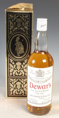 Lot 325 - A boxed bottle of Dewars fine scotch whisky,...
