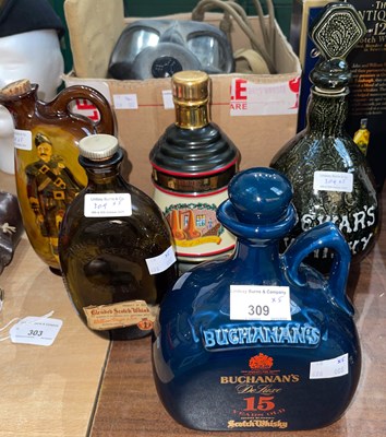 Lot 309 - A Bells 1991 Christmas decanter by Wade with...