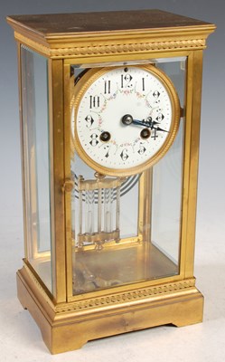 Lot 342 - An early 20th century brass mantle clock, the...