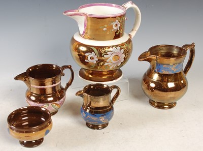 Lot 361 - A group of eleven copper lustre jugs, salts, etc.