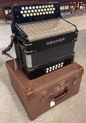 Lot 423 - A vintage Hohner push button accordion;...