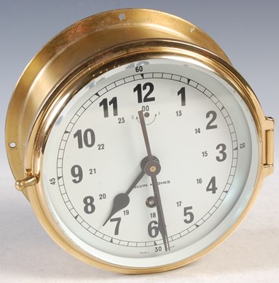 Lot 385 - Kelvin Hughes, a ships clock in brass case,...