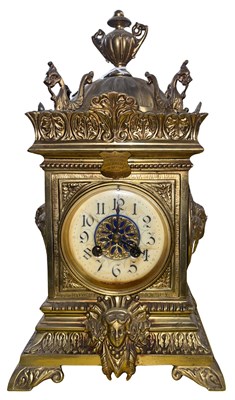 Lot 387 - A late 19th century brass mantle clock with...