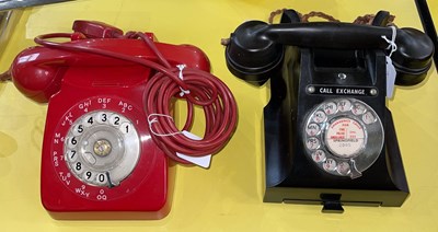 Lot 392 - A vintage GPO Rotary dial telephone in red;...
