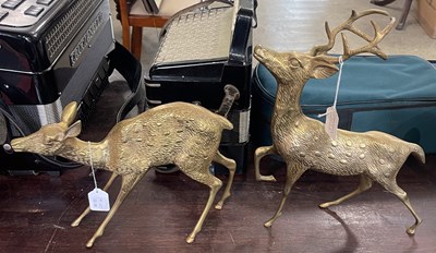 Lot 407 - A pair of brass models of Stag and Doe, the...