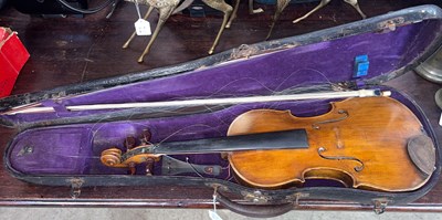 Lot 408 - An antique violin and two bows, the violin...