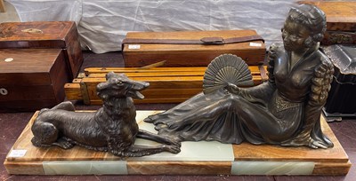 Lot 431 - An Art Deco bronzed spelter figure group of a...