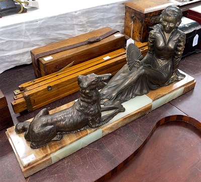 Lot 431 - An Art Deco bronzed spelter figure group of a...