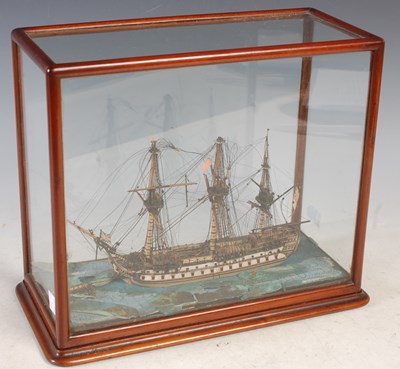 Lot 441 - A model of a three-masted Galleon in mahogany...