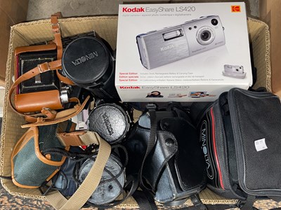 Lot 501 - Box of assorted vintage cameras, lenses,...
