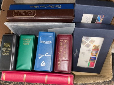 Lot 502 - Box of assorted first day covers and a red...