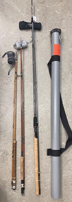 Lot 527E - Three assorted fishing rods to include...