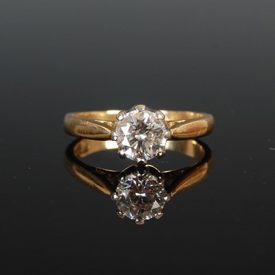 Lot 251 - An 18ct gold and diamond solitaire ring,...