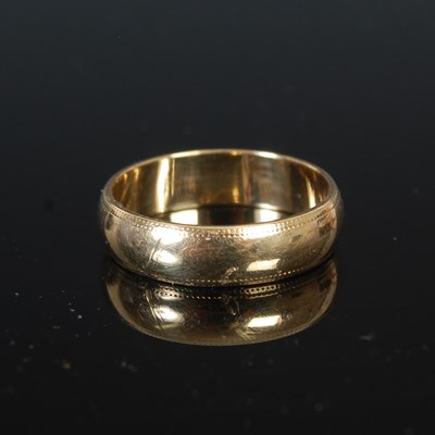 Lot 252 - A 9ct gold wedding ring, size M, 2.9 grams.