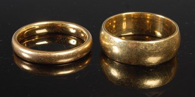 Lot 254 - Two 18ct gold wedding rings, 13.6 grams.