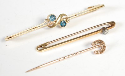 Lot 268 - Two 15ct gold bar brooches, one set with a...