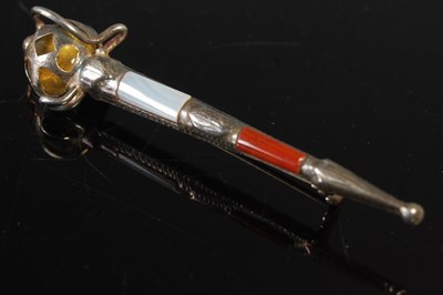 Lot 271 - A Sterling silver pebble set kilt pin/ brooch...