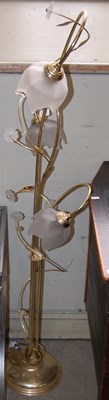 Lot 601 - A brass and frosted glass three light standard...