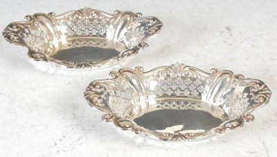 Lot 293 - A pair of white metal quatrefoil shaped bon...