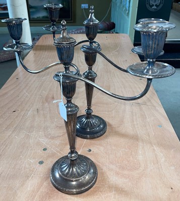 Lot 469 - A pair of antique Sheffield plate three-light...