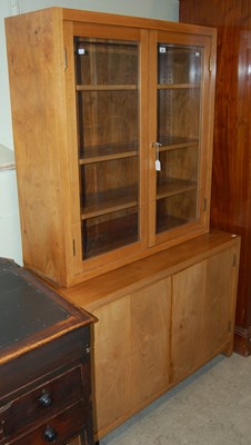 Lot 603 - A mid 20th century mahogany two part bookcase,...