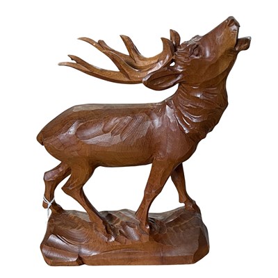 Lot 473 - A Saint Veran carved wooden model of a stag,...