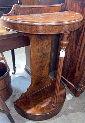 Lot 623 - A 19th century burr walnut demi-lune console...