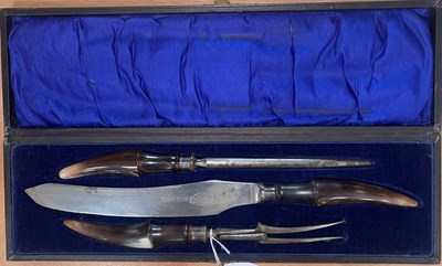 Lot 463 - An antique horn handled three piece carving...