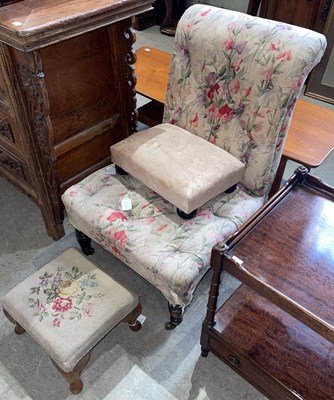 Lot 631 - A late 19th century ebonised nursing chair...