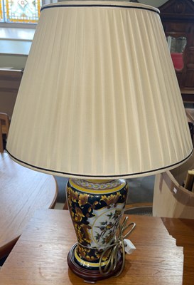 Lot 639 - An Italian style pottery table lamp and shade...