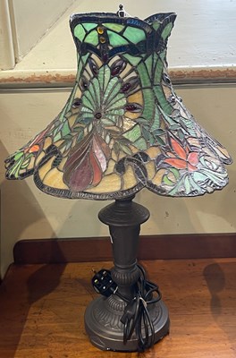 Lot 593 - A Tiffany style table lamp and shade, 57cm high.