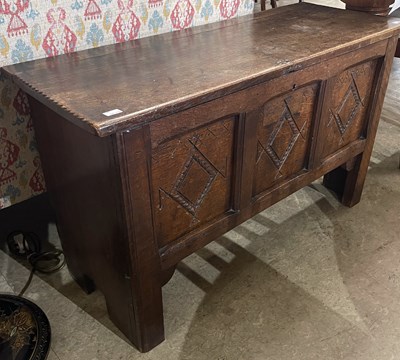 Lot 649 - An antique oak coffer, the hinged rectangular...