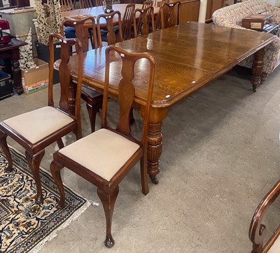 Lot 650 - A Victorian oak extending dining table,...