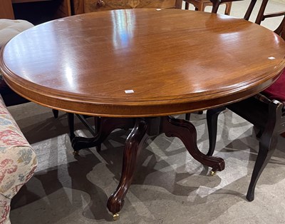 Lot 655 - A 19th century mahogany snap-top supper table,...
