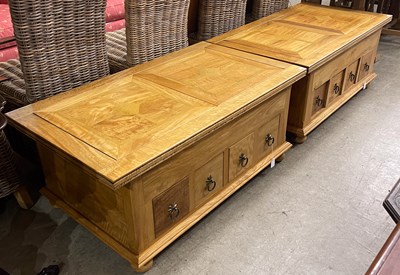 Lot 678 - A pair of modern blonde wood coffee tables,...