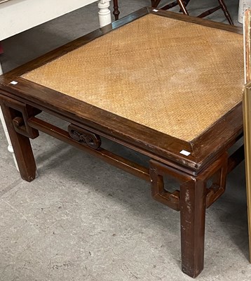 Lot 693 - A Chinese darkwood Kang table, the square top...