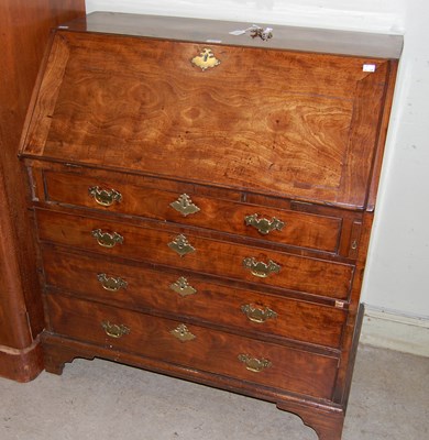 Lot 616 - A George III mahogany bureau