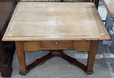 Lot 698 - A blonde wood coffee table of rectangular form,...