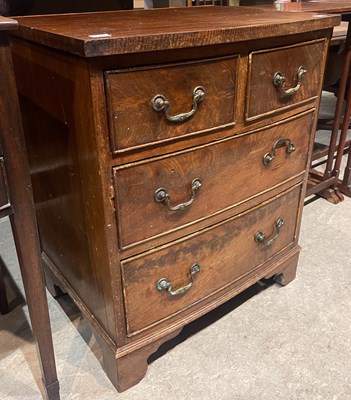 Lot 710 - A George III style mahogany bowfront chest of...