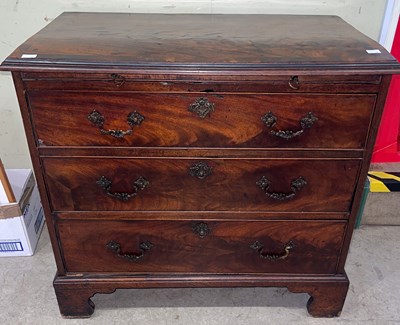 Lot 712 - An antique mahogany bachelors chest, the...