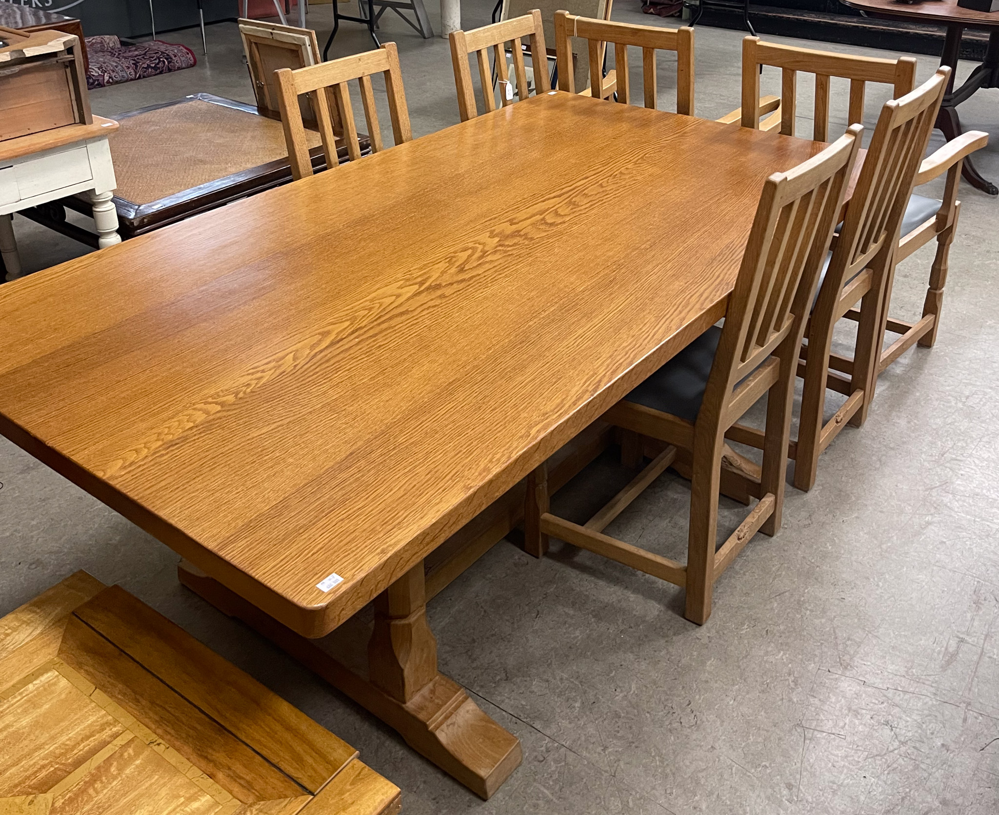 Lot 679 - Beaverman, an oak refectory table and six