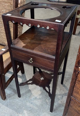 Lot 687 - A George III mahogany washstand, the square...