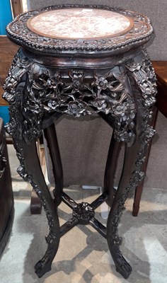 Lot 714 - A Chinese darkwood jardiniere stand, late...
