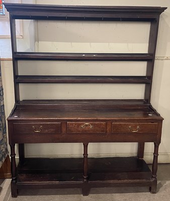 Lot 728 - An antique oak two part dresser, the upper...
