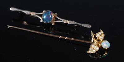 Lot 177 - A yellow metal and opal single stone bar...