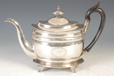 Lot 9 - A George III Scottish silver teapot and stand,...
